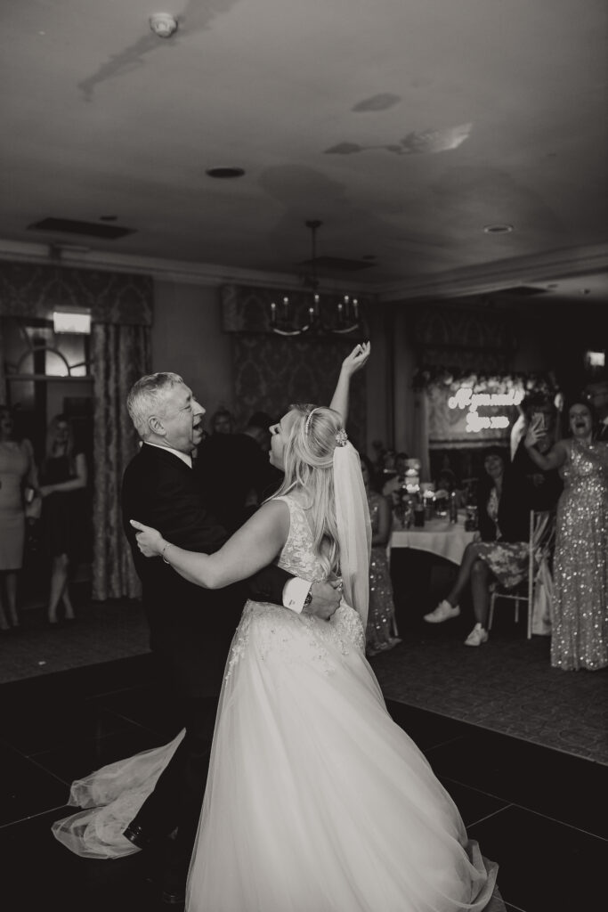 Father and bride dancing at Cheshire Wedding taken by Sophie Siddons