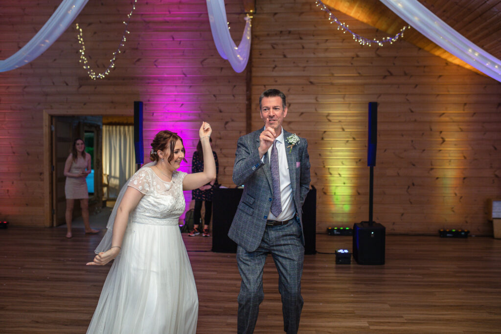Bride and father dancing at Styal Lodge