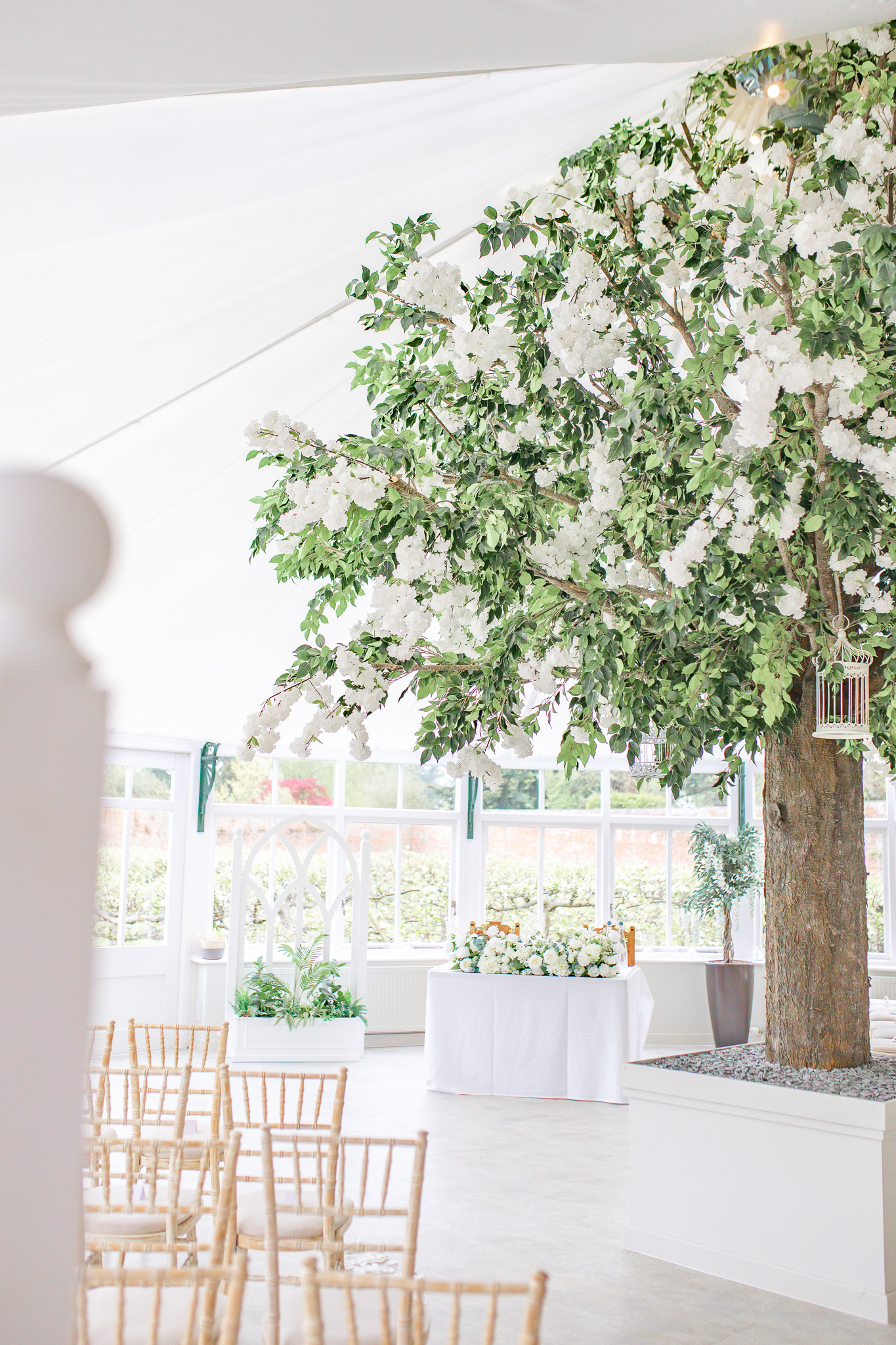 Inside the glass house ceremony room at Combermere Abbey in Cheshire