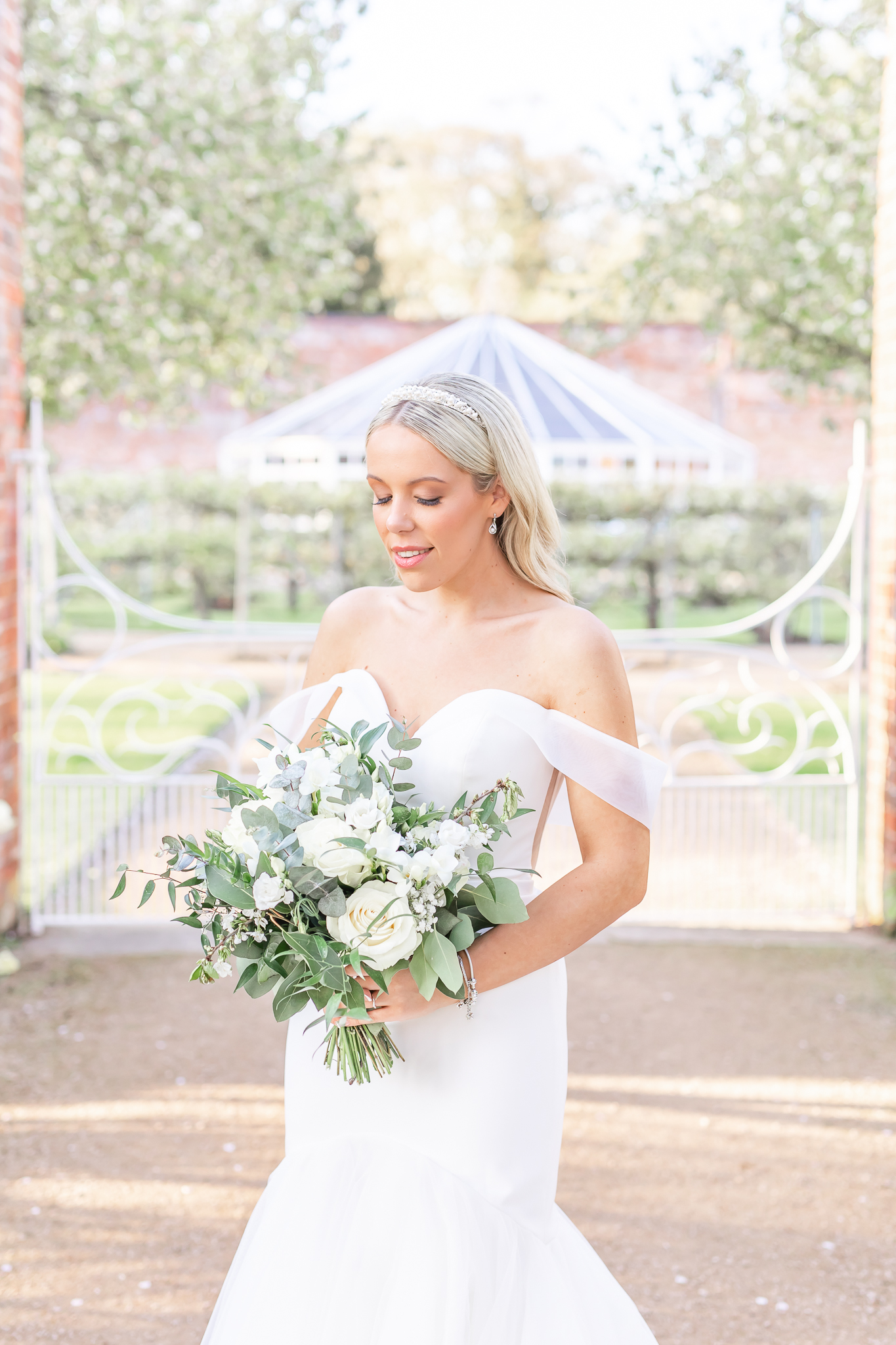 Bridal portrait of bride, Kelsey in the gardens at Combermere Abbey in Cheshire