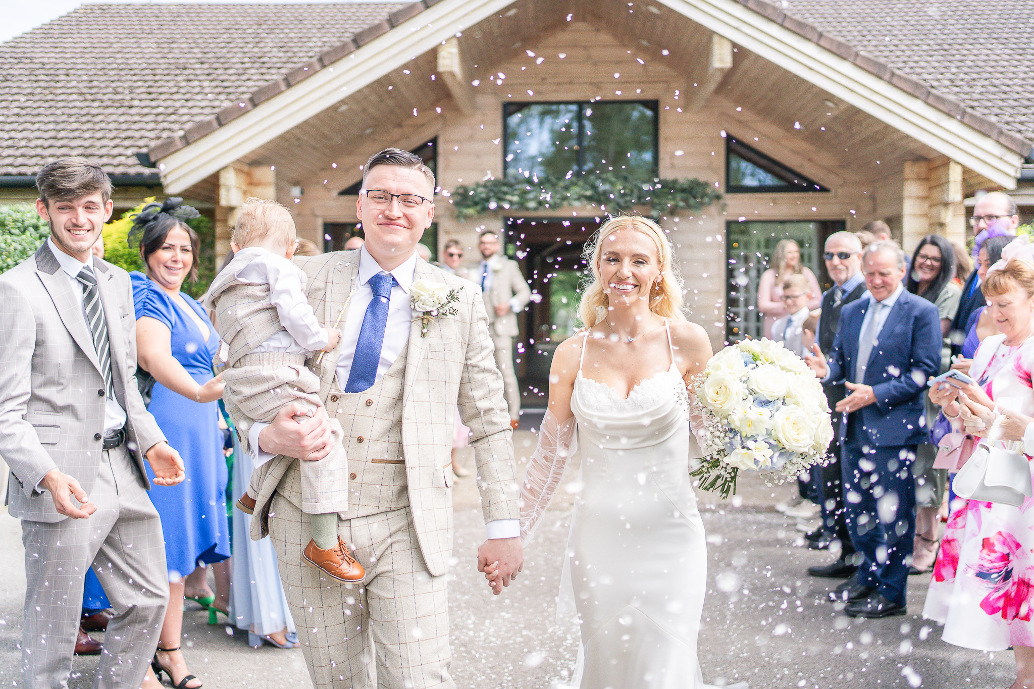 Bride and groom confetti walk