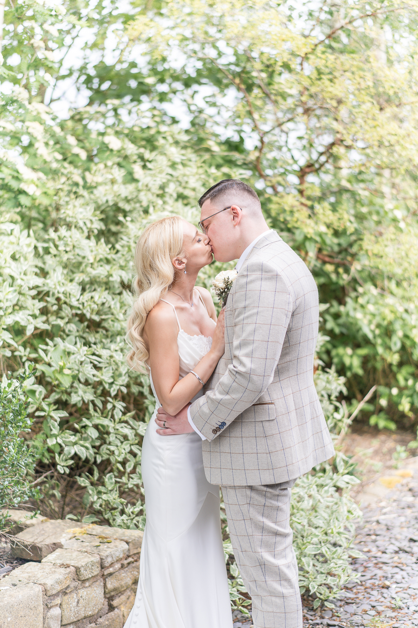 Bride and groom kissing